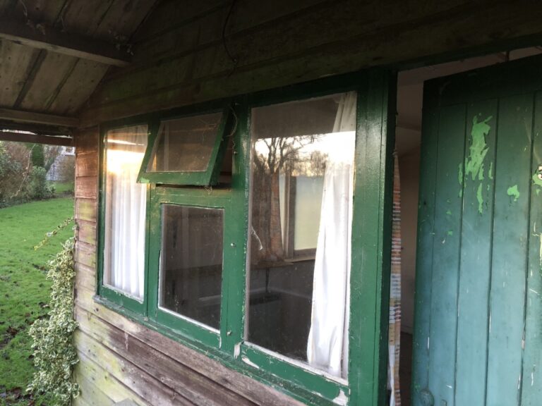 front window before conversion to picture window