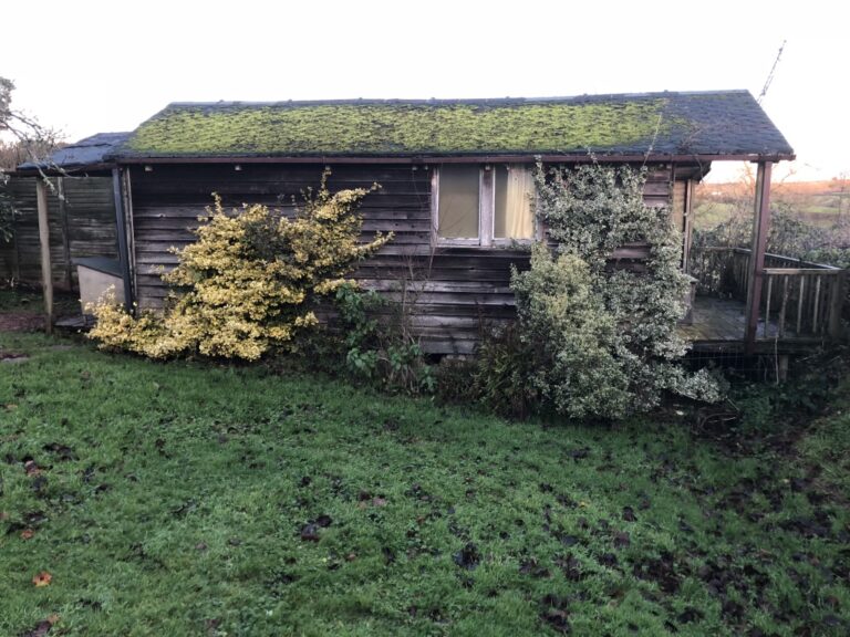 side view of lodge before conversion