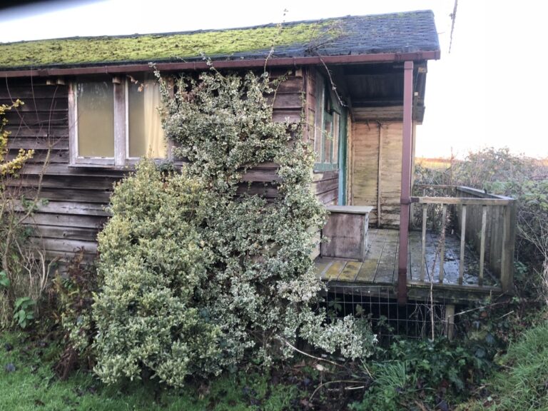 side view of lodge before conversion