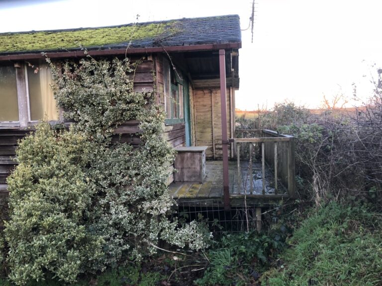 side view of lodge before conversion